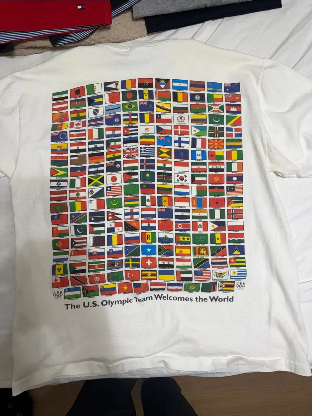 vintage 1996 Atlanta Olympics white cotton t-shirt features a vibrant grid of in